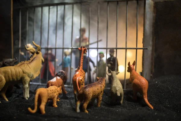 People Animals Sides Fence Concept Creative Decoration Toy Figures Burning — Stock Photo, Image