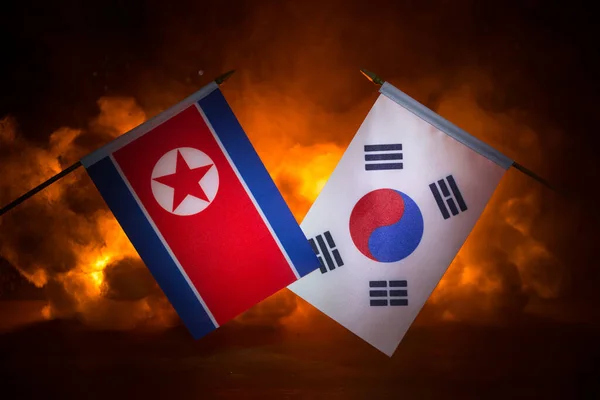 Corea Del Norte Corea Del Sur Banderas Sobre Fondo Oscuro —  Fotos de Stock