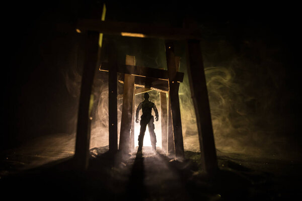 Creative artwork decoration. Abstract Japanese style wooden tunnel at night. Night scene in fantasy forest. Selective focus