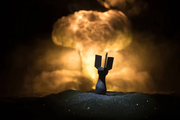 Nuclear war concept. Explosion of nuclear bomb. Creative artwork decoration in dark. Selective focus