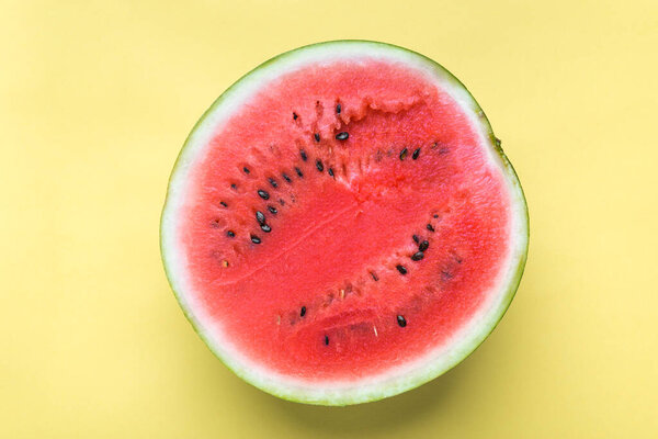 Fresh watermelon slice, fruit on yellow color background
