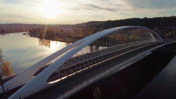 Aerial top view of modern bridge with riding cars over the River Vltava at Prague. — Stock Video