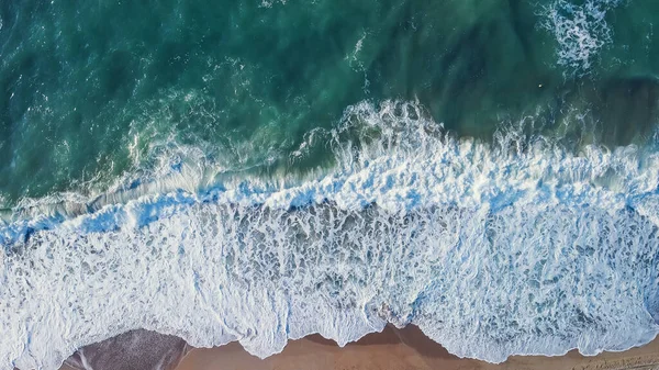 Aerial from drone of an stunning beautiful sea landscape beach with turquoise water at sunrise. Free copy space. — Stock Photo, Image