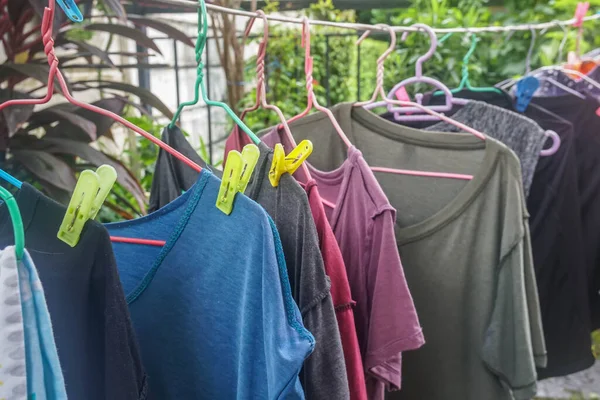 Selective Focus Hang Wet Shirts Clothes Hangers Colorful Pegs Outdoors Royalty Free Stock Photos