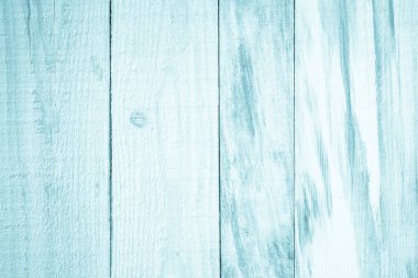 Eski grunge ahşap doku arka planı. Eski mavi tahta duvarda, nane yeşili mobilya tasarımı için antika çatlama tarzı arka plan nesneleri var. Boyalı, yıpranmış, soyulmuş, ahşap masa..
