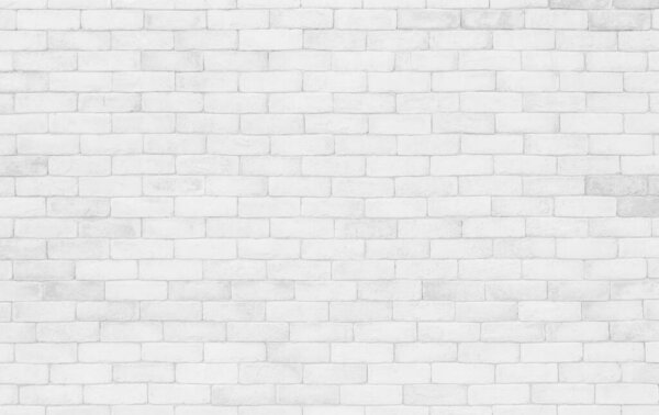 Empty white brick wall. White brick wall texture background in room at subway. Brickwork stonework interior, Clean concrete uneven abstract weathered bricks tile design, Horizontal architecture wallpaper. Aged paint white brick wall background