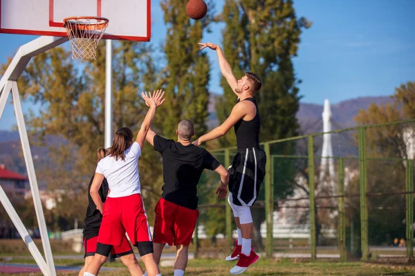 Group Of Young Friends Playing Basketball Match — Stock Photo, Image