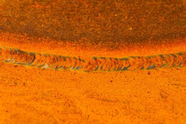 the weld seam is rusted on the metal structure