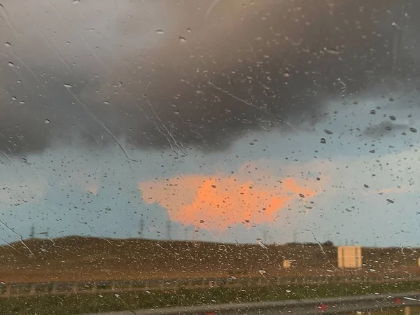 Eine Straße Hintergrund Eines Sonnenuntergangs Regen — Stockfoto