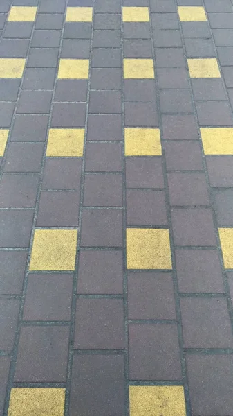 Sidewalk tegels met een patroon, die het voetgangersgebied bedekken — Stockfoto