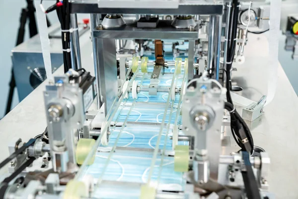 Face mask production line in modern factory