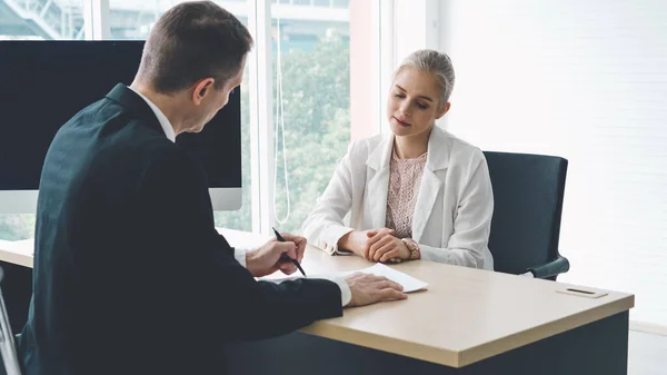 Job seeker in job interview meeting with manager