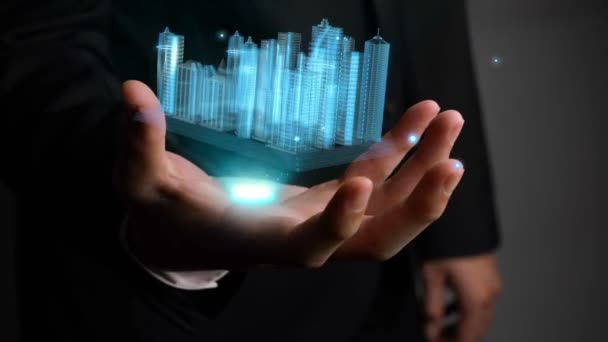 Affärsman innehar 3D-stadsmodell visar augmented reality-teknik — Stockvideo