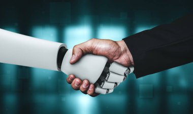 Gelecekteki teknolojiyle işbirliği yapmak için insansı robot tokalaşması