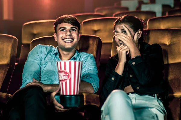 A couple of caucasian watch a movie in the cinema — Stock Photo, Image