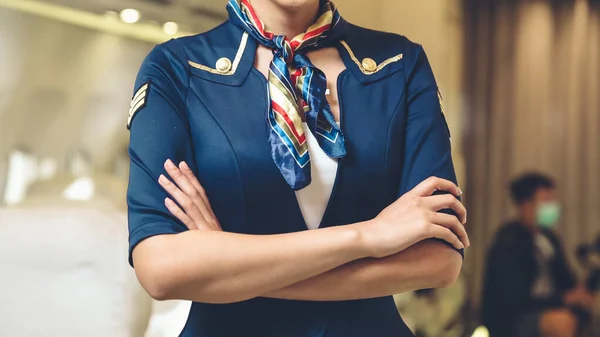 Cabin crew or air hostess working in airplane — Stock Photo, Image