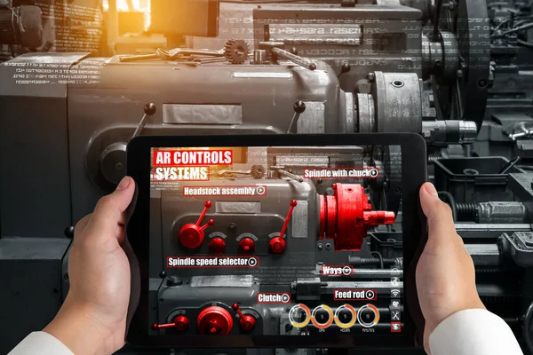 Engineer use augmented reality software in smart factory production line
