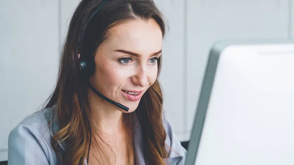 Business people wearing headset working in office — Stock Photo, Image