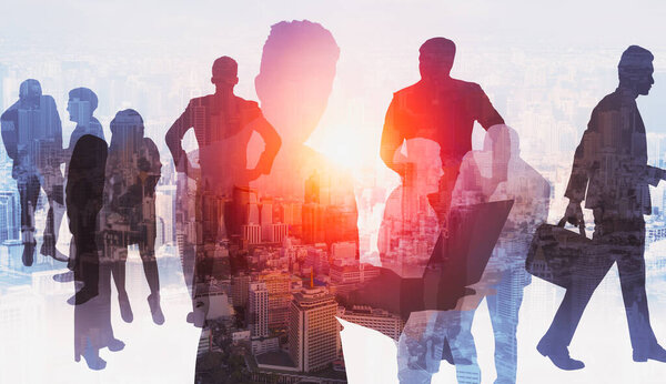 Abstract image of many business people together in group on background of city