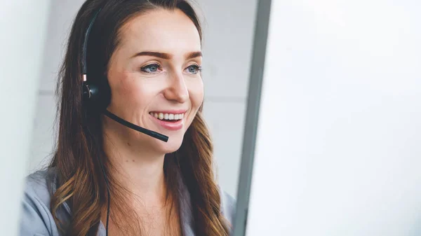 Business people wearing headset working in office