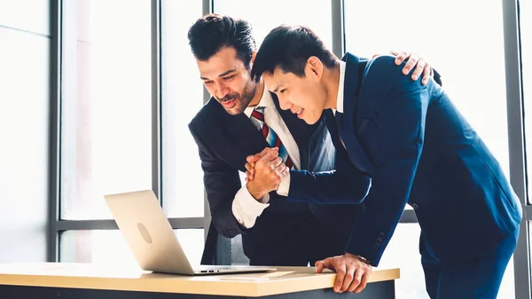 Two happy business people celebrate at office — Stock Photo, Image
