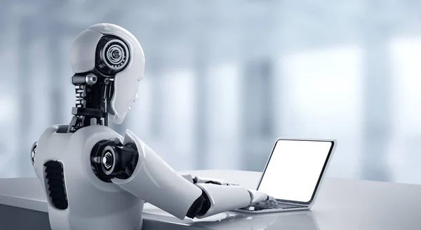 Robot humanoid use laptop and sit at table in future office