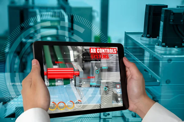 Engineer use augmented reality software in smart factory production line