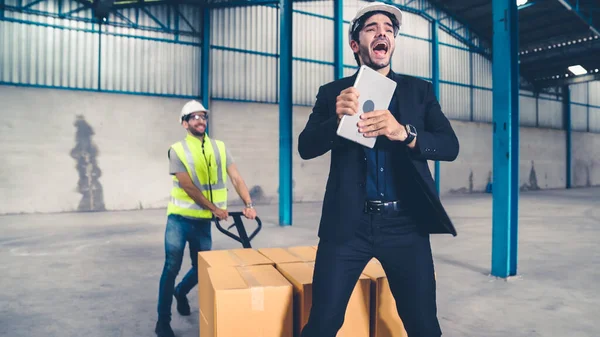 Funny factory workers dance in the factory — Stock Photo, Image