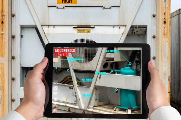 Engineer use augmented reality software in smart factory production line