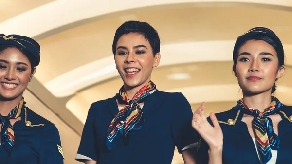 Cabin crew dancing with joy in airplane — Stock Photo, Image