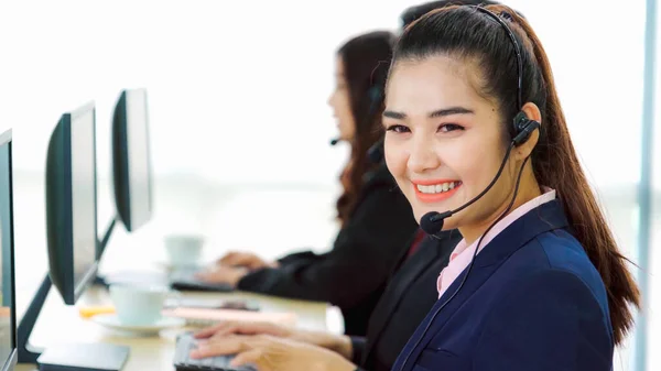 Business people wearing headset working in office — Stock Photo, Image