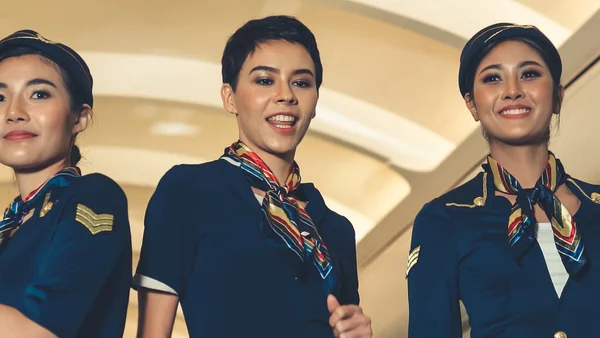 Cabin crew dancing with joy in airplane — Stock Photo, Image