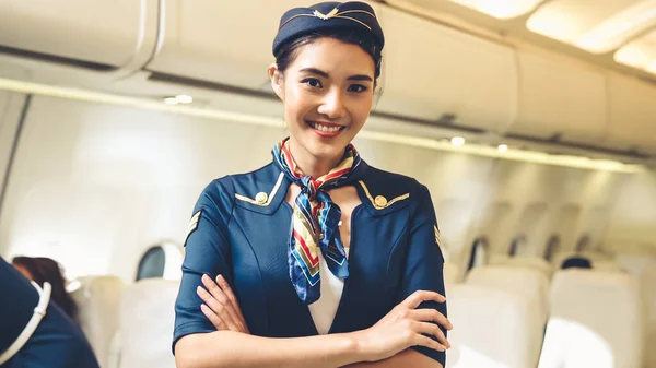 Cabin crew or air hostess working in airplane