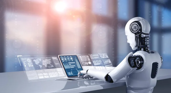 Robot humanoid använda laptop och sitta vid bordet för big data analytics — Stockfoto