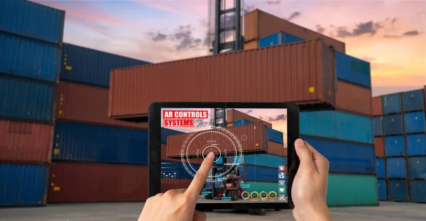 Engineer use augmented reality software in cargo container yard