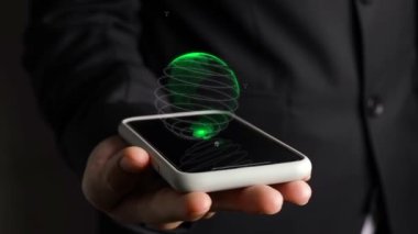 Dünya holografik teknolojisiyle insan eli cep telefonu.