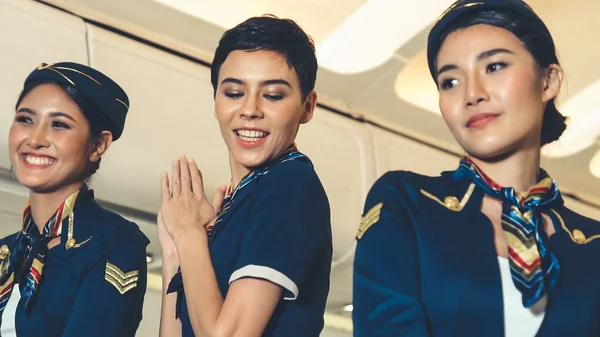 Cabin crew dancing with joy in airplane — Stock Photo, Image