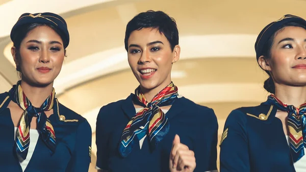 Cabin crew dancing with joy in airplane — Stock Photo, Image