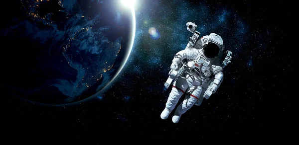 Astronaut spaceman do spacewalk while working for space station