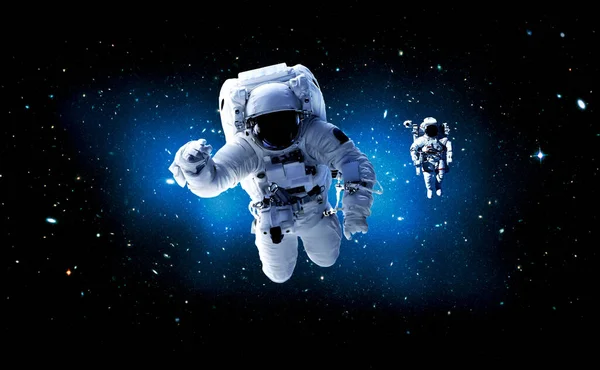 Astronaut spaceman do spacewalk while working for space station