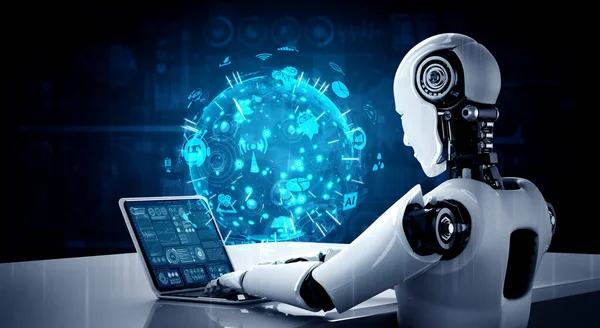 Humanoide Roboter nutzen Laptop und sitzen am Tisch für globale Netzwerkverbindung — Stockfoto