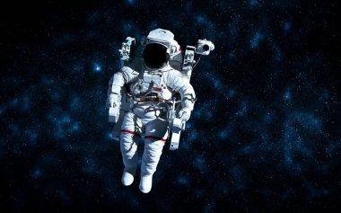 Astronot uzay yürüyüşü yaparken uzay istasyonu için çalışır.