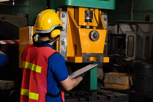 Skillful factory worker or engineer do machine job in manufacturing workshop — Stock Photo, Image