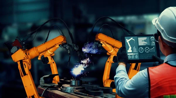 Modernisation des bras robotisés de l'industrie intelligente pour une technologie industrielle innovante — Photo