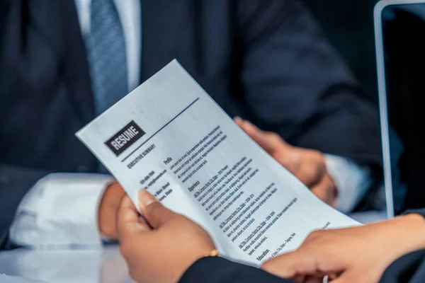 Human resources department manager reads CV resume — Stock Photo, Image