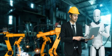 Mekanize endüstri robotu ve insan işçileri gelecekteki fabrikada birlikte çalışıyorlar.