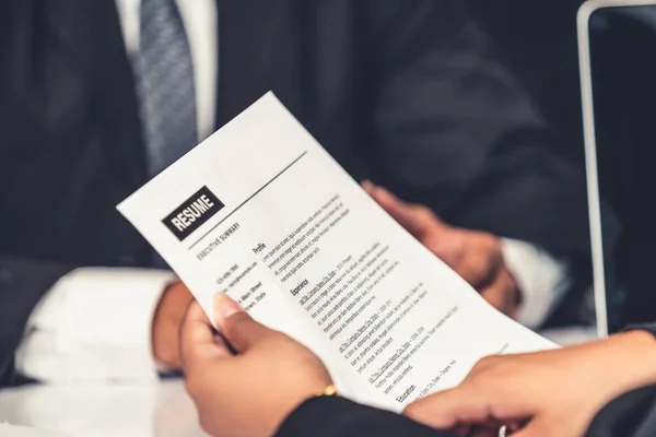 Human resources department manager reads CV resume — Stock Photo, Image