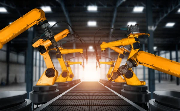 Mechaniczne ramię robota przemysłowego do montażu w fabrycznej linii produkcyjnej — Zdjęcie stockowe
