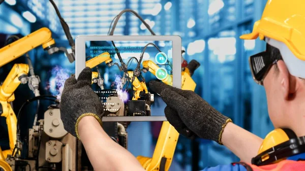 Modernisation des bras robotisés de l'industrie intelligente pour une technologie industrielle innovante — Photo