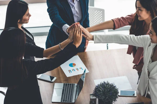 Teamwork businesswomen joining hands in meeting. — Stock Photo, Image